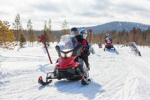 Snowmobiling Muonio, Finland © Harriniva